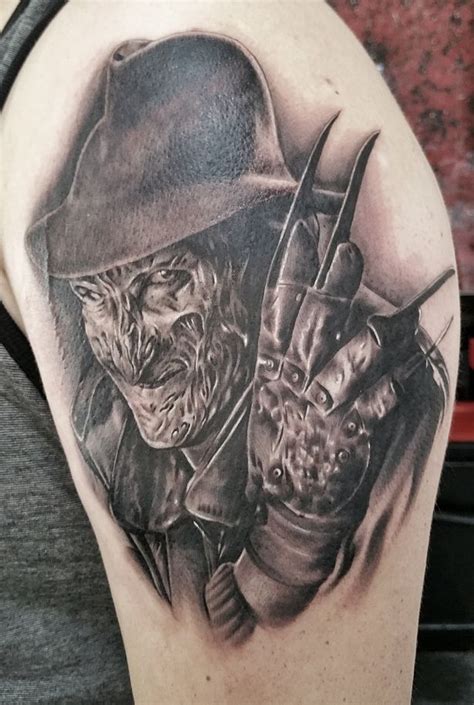 Brilliant Jason Mask With Clown And Freddy Krueger Tattoo On Right Half
