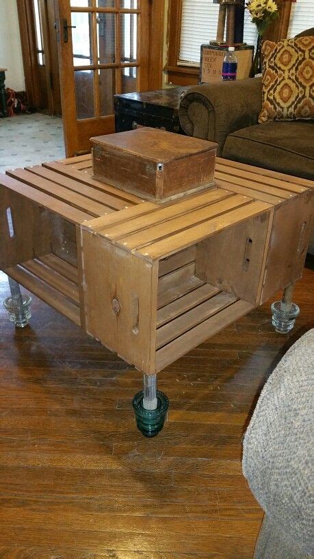 Apple Crate Coffee Table With Insulators And Post For The Legs And An