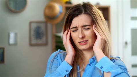 Tired Young Woman Holding Her Head On Hands Feel Headache Depression