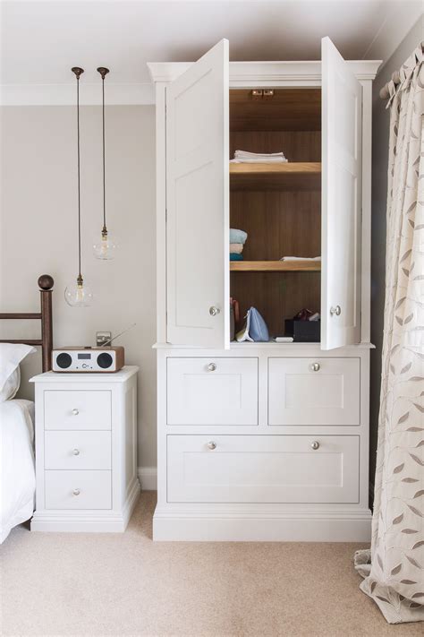 A Peak Inside A Bespoke Tall Dresser Unit With Oak Shelves Modern