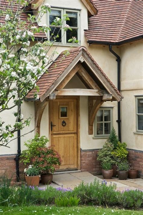 Transform your porch with a front door canopy. border oak - oak framed houses, oak framed garages and ...