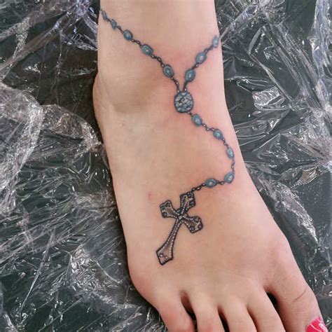 Love pink rosary tattoo on foot for girls. 18 Blessed Cross & Rosary Ankle Tattoos