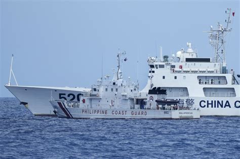 Chinese Coast Guard Threatens Philippine Ships In Disputed Area The