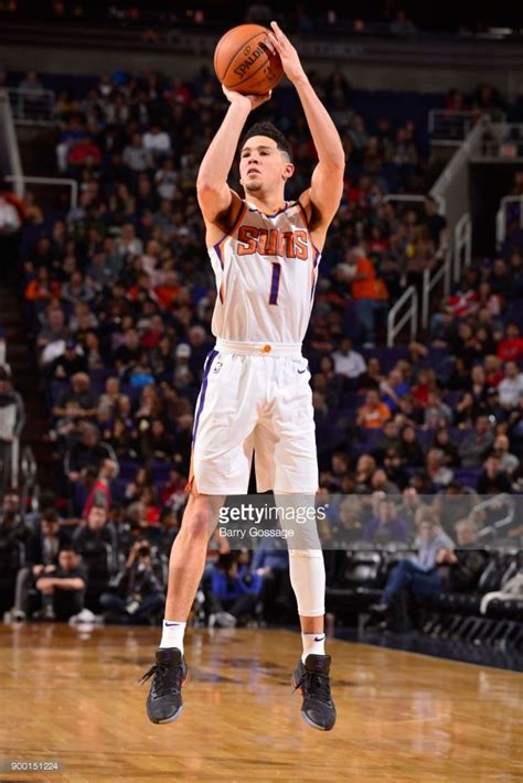 23 января 09:00 devin booker, nikola jokic top points from phoenix suns vs. News Photo : Devin Booker of the Phoenix Suns shoots the ...