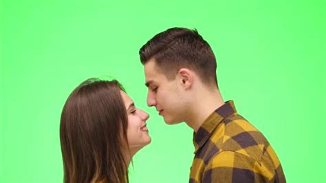 Loving Couple Look At Each Other And Begin To Kiss Green Screen Slow