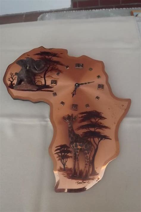 Cuckoo And Wall Clocks Africa Copperplate Wall Clock Was Sold For R55
