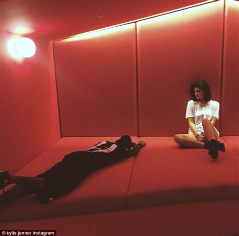 Kendall And Kylie Jenner Lounge On A Couch On Either Side Of Lil Twist