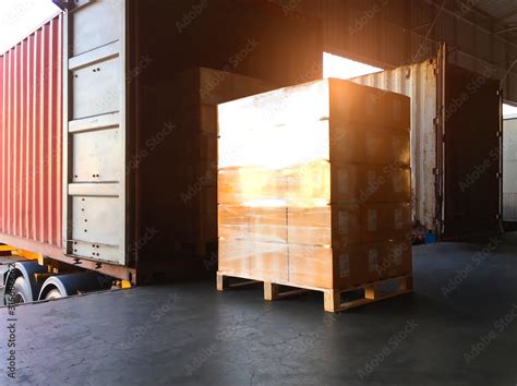 Packaging Boxes Stacked Wrapped Plastic On Pallets Loading Into