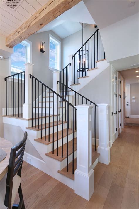 This modern stair railing highlights unconventional lines to show off a trendy chic style. Modern Farmhouse 14 - Decoratoo | Dream house, House ...