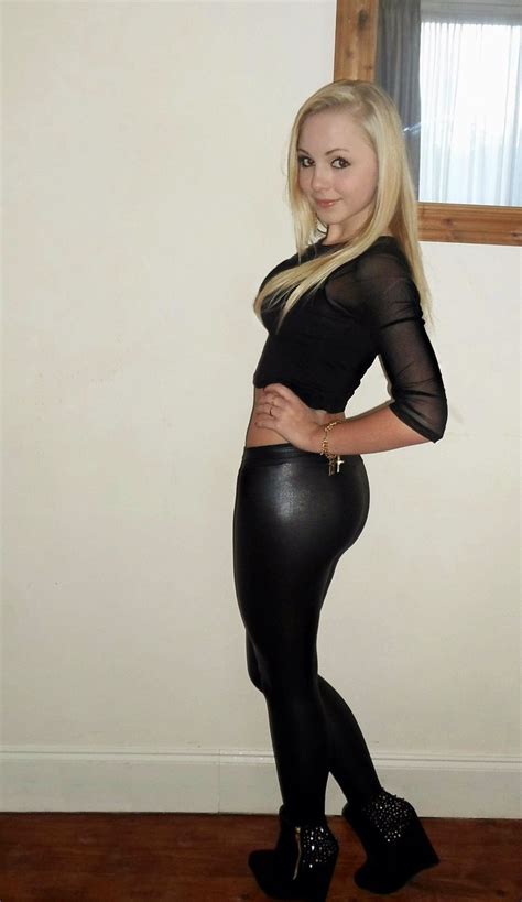 Sexy Blonde In Shiny Black Leggings