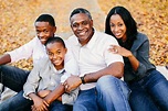 "A Beautiful African American Family Sitting Outside" by Stocksy ...