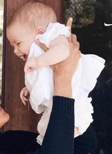 Lilibet S First Photo Released Prince Harry And Meghan Markle S Daughter Smiles In Christmas