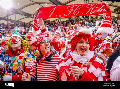 Colorfully Costumed Carnivalists Celebrate Carnival In Cologne On Weiberfastnacht The Street