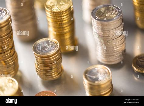Towers Of The Euro Coins Stacked In Different Positions Stock Photo Alamy