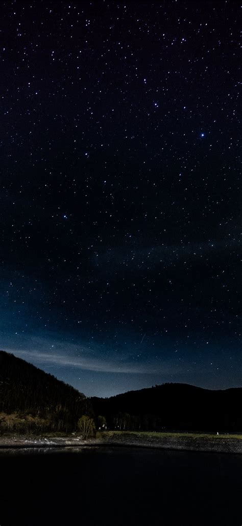 Mountains Under Starry Sky During Nighttime Iphone Wallpapers Free Download