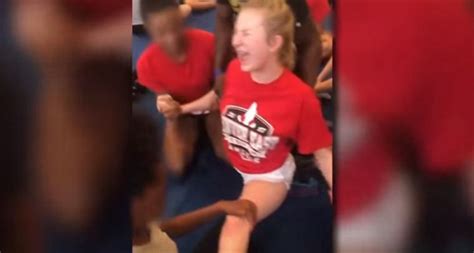 disturbing video shows high school cheerleaders screaming as they re forced to do splits