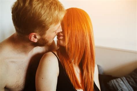 Free Photo Romantic Couple Kissing At Home