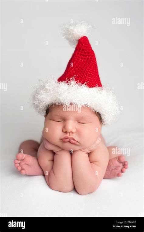 Little Girl Is Wearing A Red And White Hat Hi Res Stock Photography And