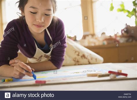Girl Drawing With Pastels In Art Class Stock Photo Alamy