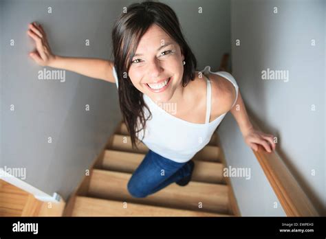 Woman Walking Up Stairs Stock Photo Alamy