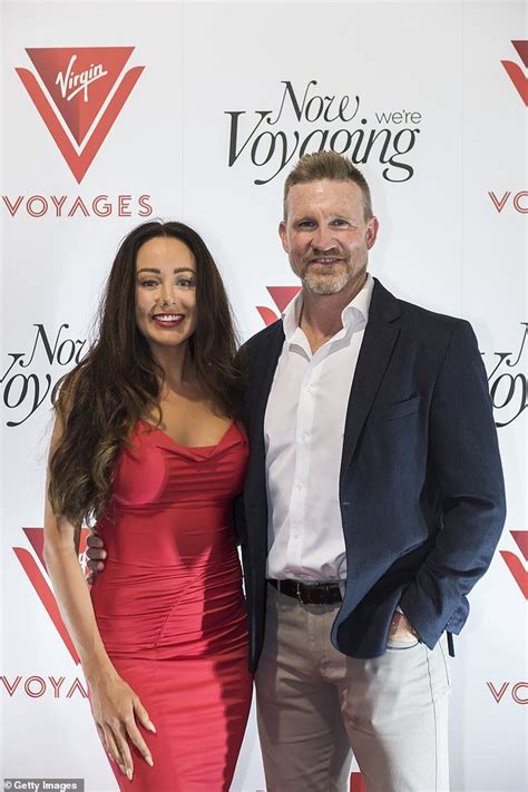 Afl Legend Nathan Buckley And His Glamorous Girlfriend Brodie Ryan Look More Loved Up Than Ever