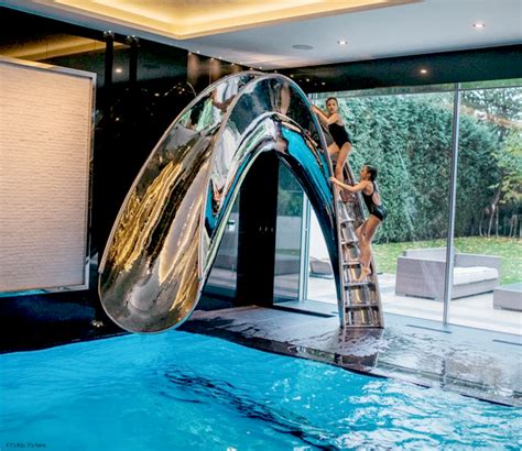 Splinterworks Custom Luxury Pool Slides In Stainless Steel And Resin