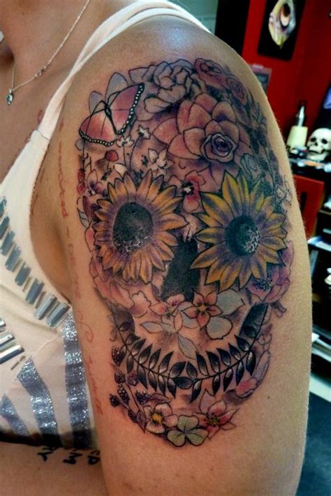 Whats the symbolism behind the flower skull tattoo? Day of the Dead skull with flowers by Mully : Tattoos