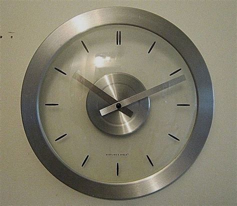 Sterling And Noble Metal And Acrylic Wall Clock Silver Metal Frame