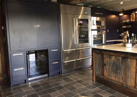 Case Study Stone Flooring Perfect For A Navy Blue Kitchen