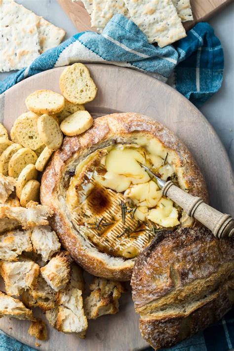 Brie should be served with a red wine such as a cabernet sauvignon, merlot or malbec. Baked Brie in a Sourdough Bread Bowl - Foodness Gracious