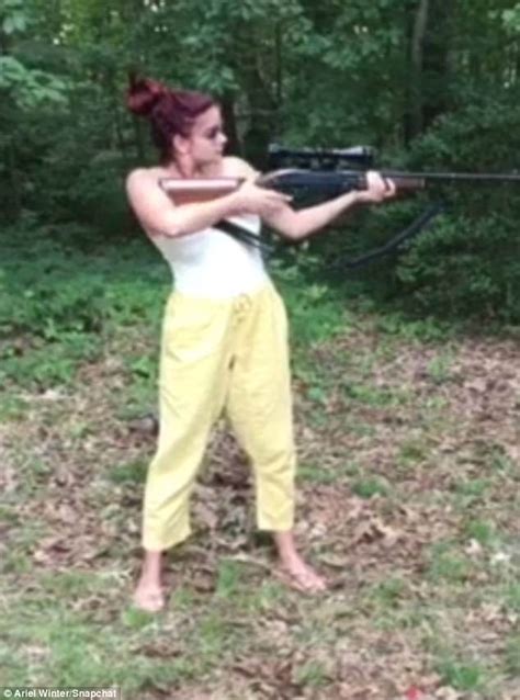 Ariel Winter Covers Up To Shoot Gun During Target Practice Daily Mail