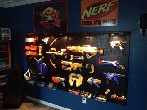 All the supplies are about $40 at home depot: Nerf Gun Rack Wall Mounted - Nerf Pegboard Gun Rack - We ...