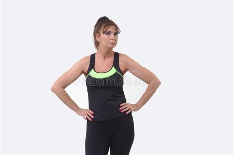 Attractive Middle Aged Woman In Sports Gear Ready To Exercise Stock