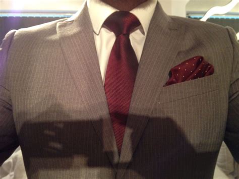 Light Grey Pinstripe Suit White Shirt Burgundy Tie And Pocket Square