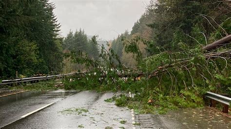 atmospheric river slams pacific northwest at least 1 person missing schools and roads closed