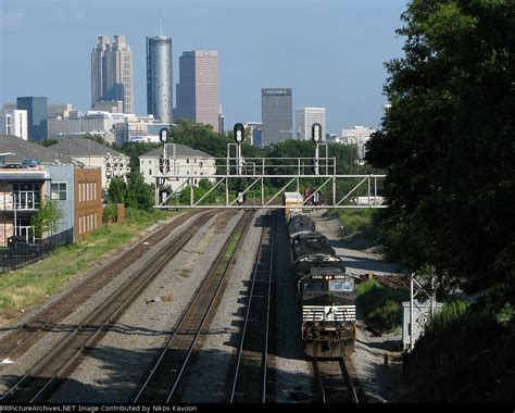 Ns Mixed Freight Heads North With The Skyline In The Background