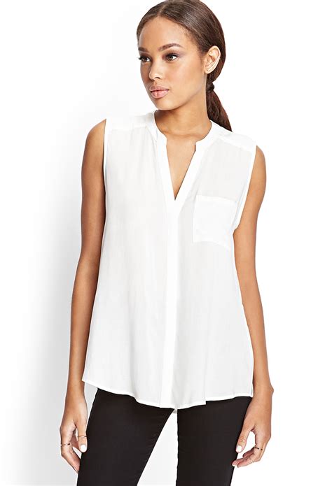 Hilton Head Ladies White Sleeveless Blouse With Collar What Are Saudi