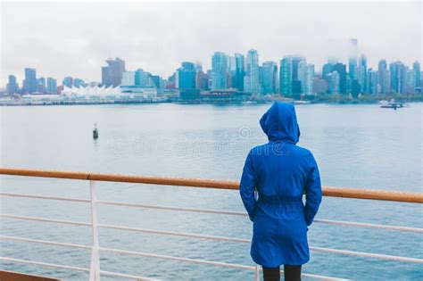 Autumn City Scenery Woman Walking Alone Under The Rain Wearing Blue