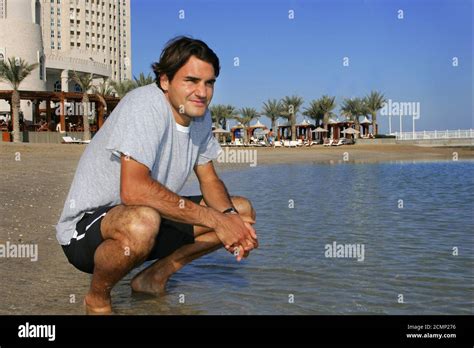Roger Federer Takes A Walk On The Beach In Doha Qatar 05 Jan 2006