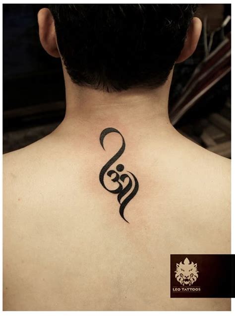 These beautiful om tattoo examples show off the crossover use of paint/ink calligraphy body art. #omtattoo #necktattoo #realtattoo #indiantattoo # ...