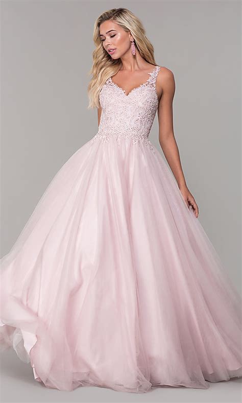Bridal and tux rentals in your area might also rent bridesmaid dresses that double as prom dresses. Long Dusty Pink Tulle Prom Dress with Embroidery