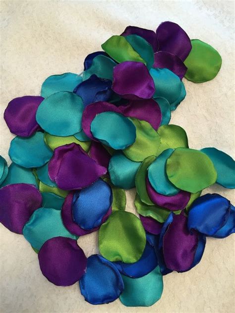 This is a pure natural shade, which is well suited for office look as for a romantic rendezvous. Peaock Petals/Aisle Petals/Peacock Rose Petals/Peacock Wedding/Peacock Decorations/Artificial ...
