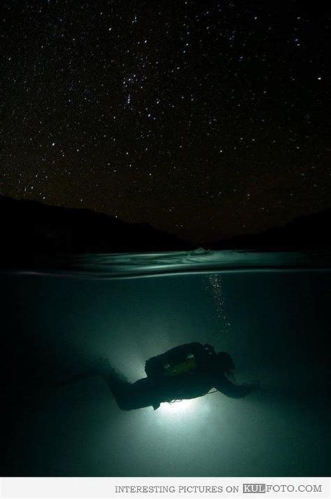 Night Scuba Diving Underwater Picture Of A Scuba Diver Under The