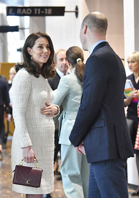 Kate Middleton Pictured Cradling Her Baby Bump In Sweden