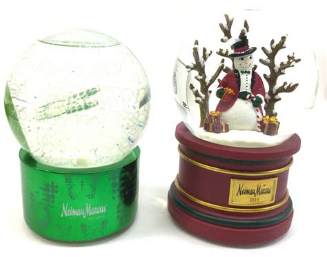 Lot 2 Neiman Marcus Collectible Snow Globes