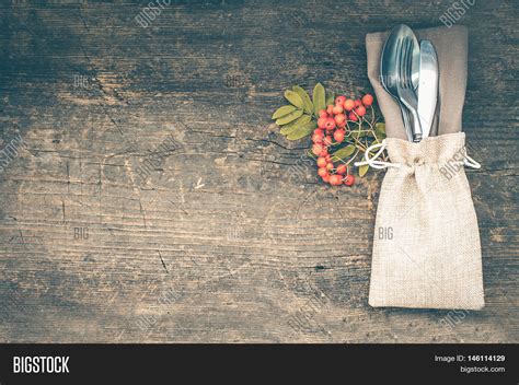 Thanksgiving Autumn Place Setting With Cutlery On Wooden