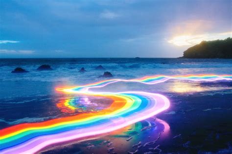 Vivid Rainbow Roads Trace Illuminated Pathways Across Forests And