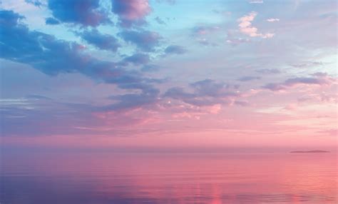 Find images of pink sunset. Misty Lilac Seascape With Pink Clouds Stock Photo - Download Image Now - iStock