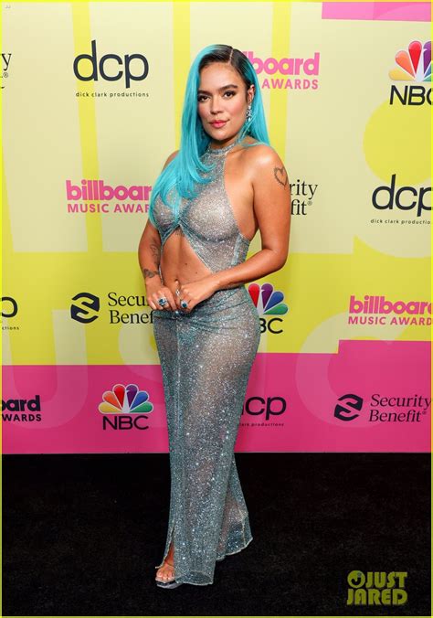But good songs thrive in any setting, with anyone or no one. Karol G Rocks Bright Blue Hair & A Shimmering See-Through Look at the Billboard Music Awards ...