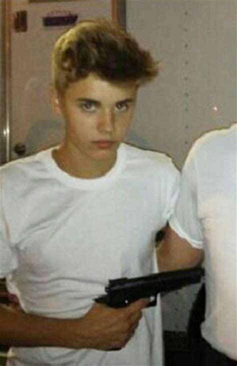 Justin Bieber In Trouble For Posing With A Gun With Selena Gomez